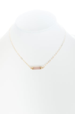 Chalcedony (pink) barrel set in gold with gold-filled chain.