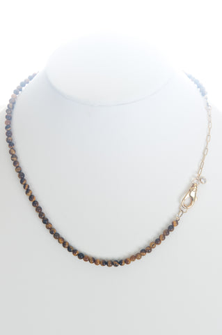 Tiger Eye beads with gold clasp, gold chain, and Cubic Zirconia charm