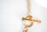 Gold chain with gold toggle and Peridot stone