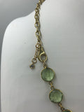 Amethyst (green) in gold bezel with gold-filled chain