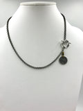 Silver necklace with toggle and antique silver coin