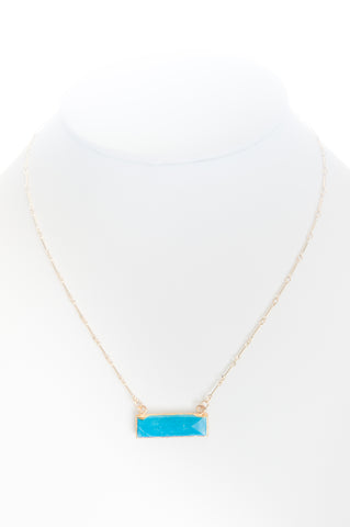 Howlite (turquoise) set in gold with gold-filled chain
